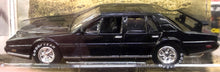 Load image into Gallery viewer, EVEL KNIEVEL Aston Martin Lagonda 1/64 scale Snapshot "Don't blink, or you'll miss him!"