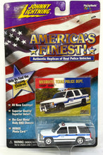 Load image into Gallery viewer, 1997 Chevy Tahoe Police Car Johnny Lightning America's Finest!