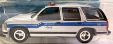 Load image into Gallery viewer, 1997 Chevy Tahoe Police Car Johnny Lightning America's Finest!